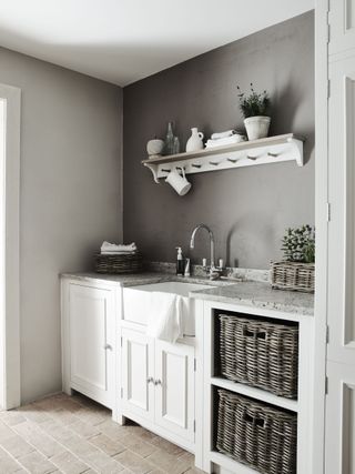 a white and grey Neptune utility room with a butler's sink and open shelving