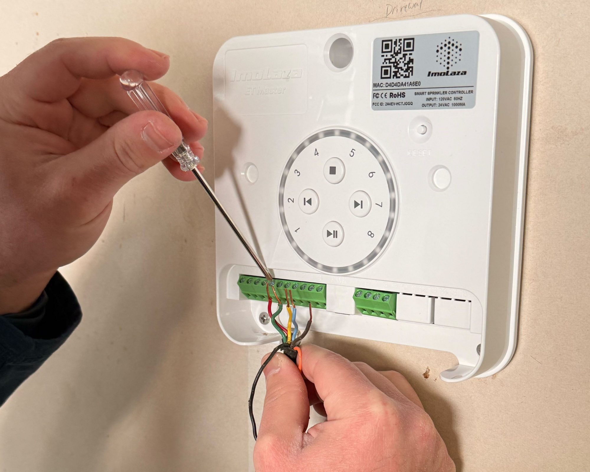 ImoLaza smart sprinkler system being installed