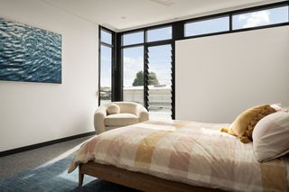 A bedroom facing a window