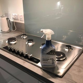 stainless steel cleaner and wooden counter