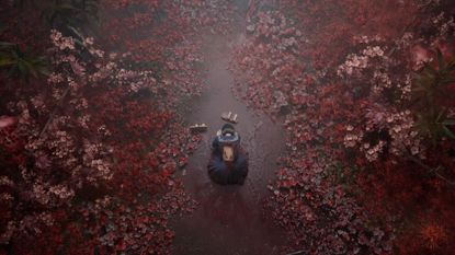A screenshot shows Hinako slumped on the ground surrounded by red spider lilies 