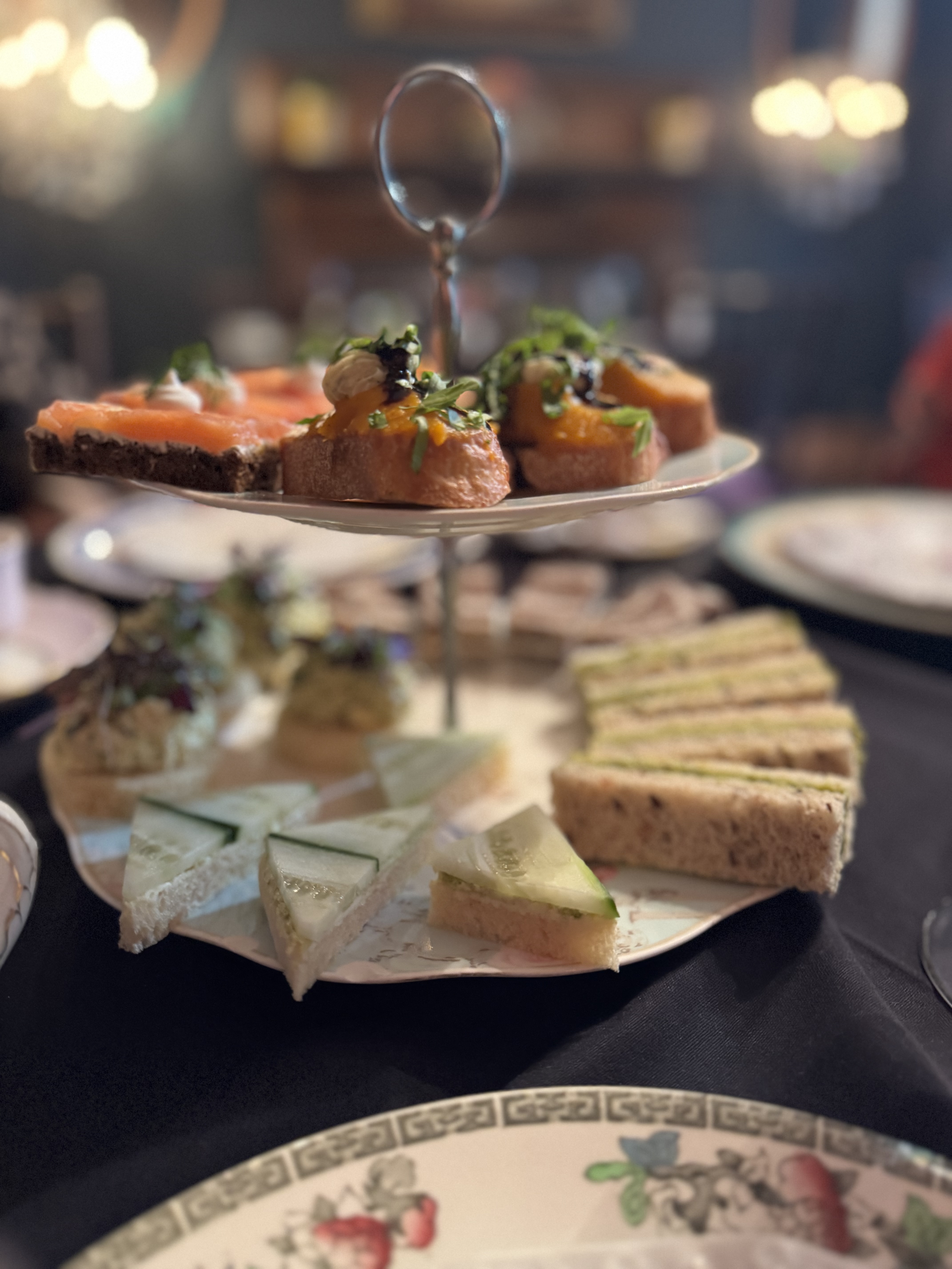 A tiered tray of tea sandwiches