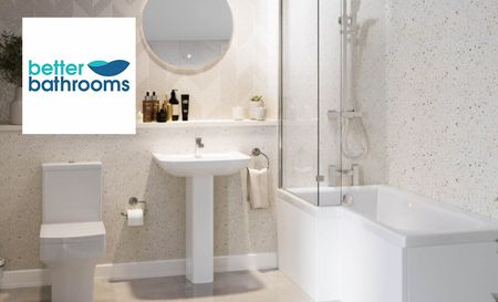 Image of a renovated White Better Bathrooms with all white millennial accents from the sink to the toilet and the tub and shower with green pops of plants