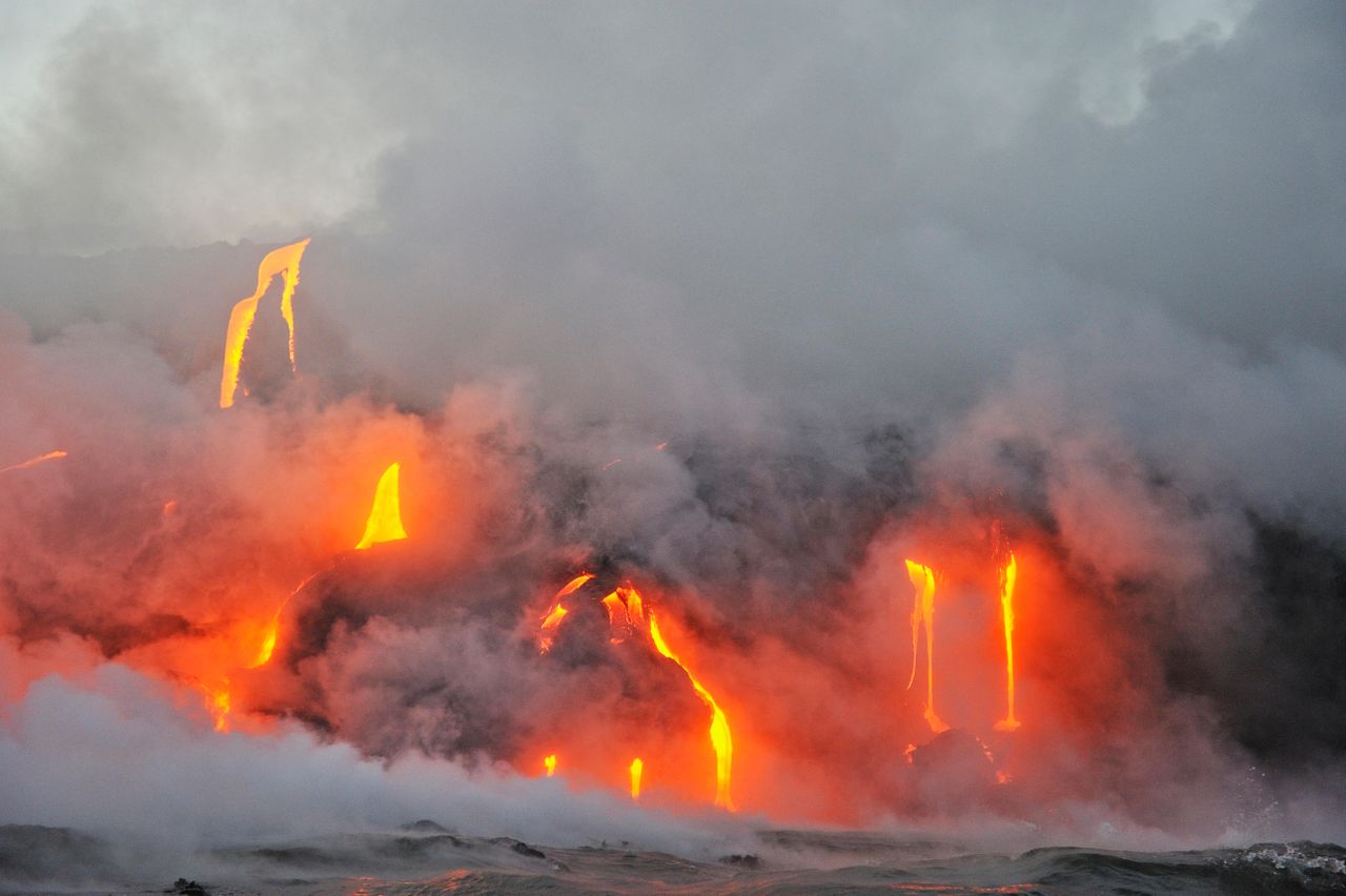 Molten lava flowing to the sea from Kilauea Volcano, Big Island, Hawaii, USA