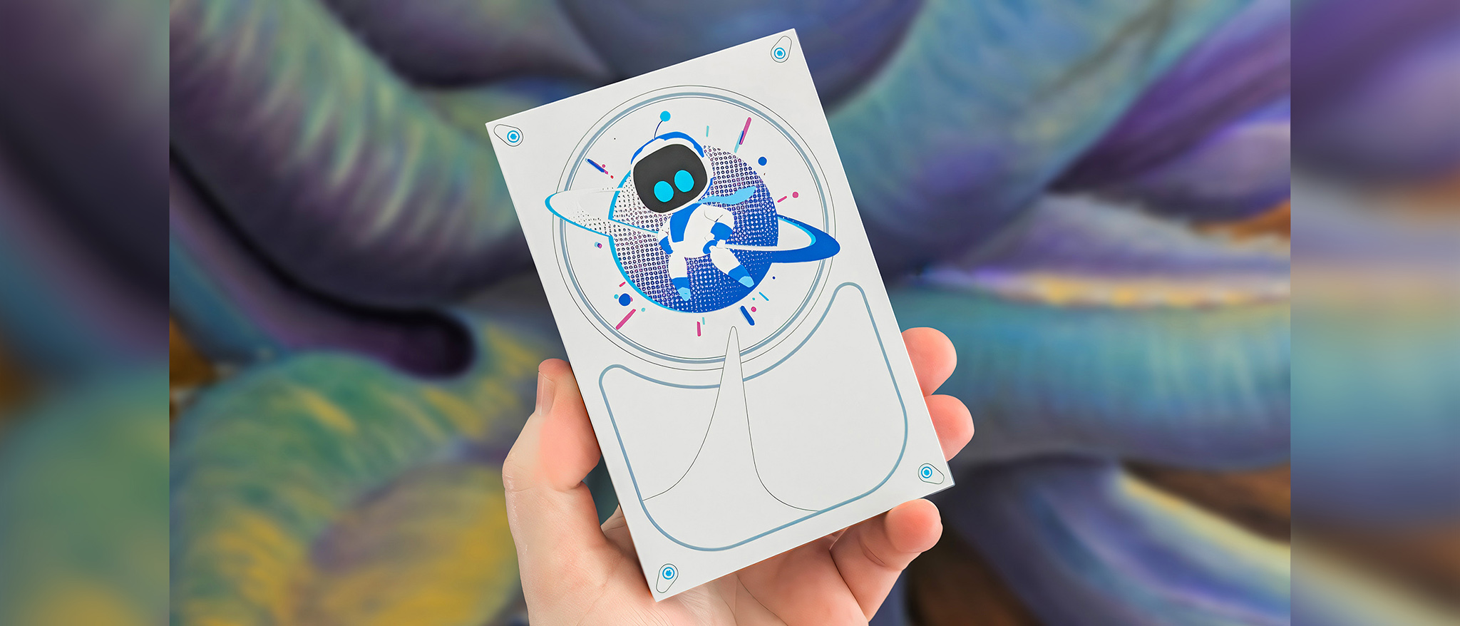 A hand holding the Seagate Astro Bot Limited Edition Game Drive in ftong of a colorful background. 