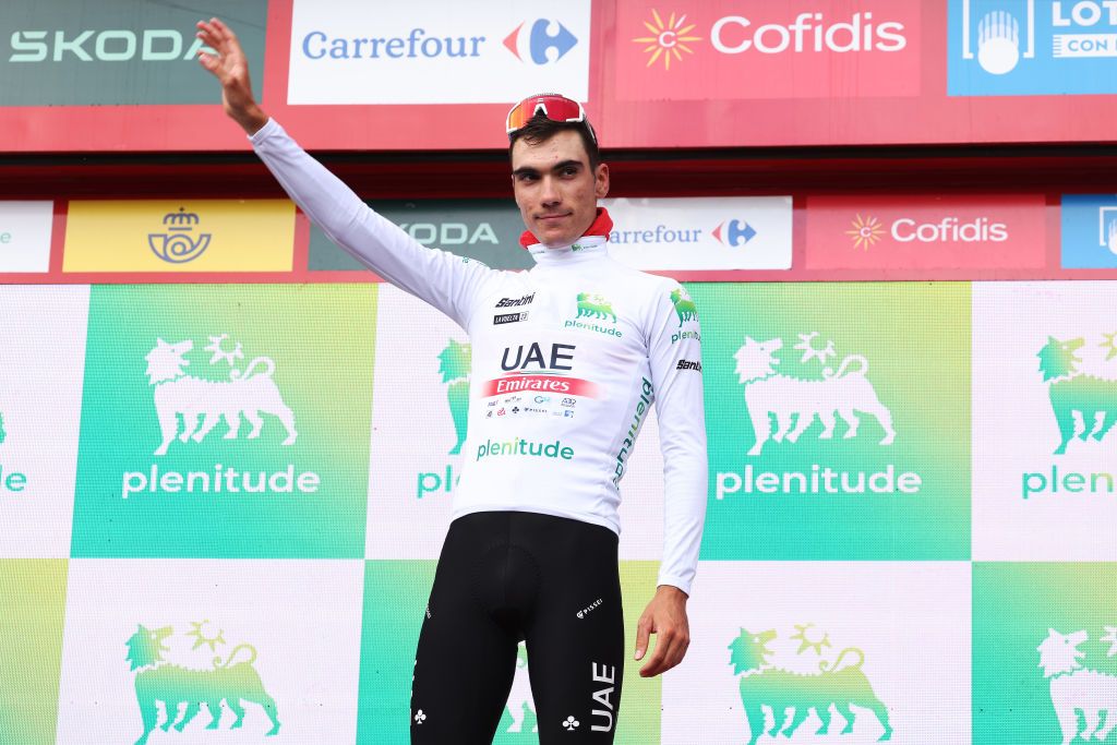 BEJES SPAIN SEPTEMBER 12 Juan Ayuso of Spain and UAE Team Emirates White Best Young Rider Jersey celebrates at podium during the 78th Tour of Spain 2023 Stage 16 a 1201km stage from Liencres to Bejes 528m UCIWT on September 12 2023 in Bejes Spain Photo by Alexander HassensteinGetty Images