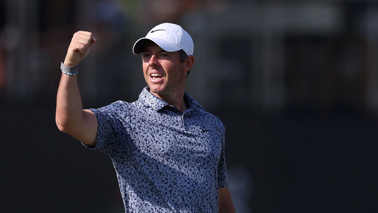 Rory McIlroy fist pumps after winning the Dubai Desert Classic