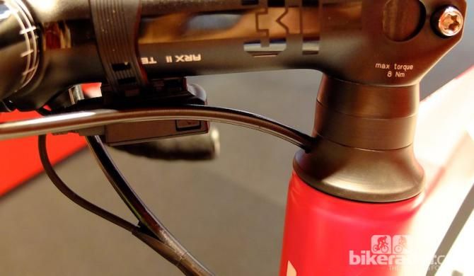 The BMC GranFondo GF01 Disc's front brake hose cleverly passes through the headset top cap and in to the steerer tube