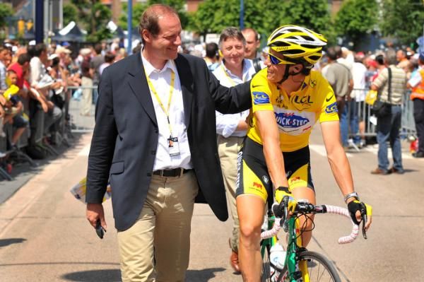Christian Prudhomme is pleased to see a Frenchman in yellow.