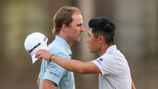 Russell Henley is congratulated by Collin Morikawa at the Arnold Palmer Invitational