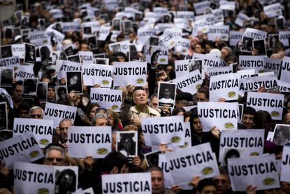 People call for justice on the anniversary of the terrorist attack in Buenos Aires.