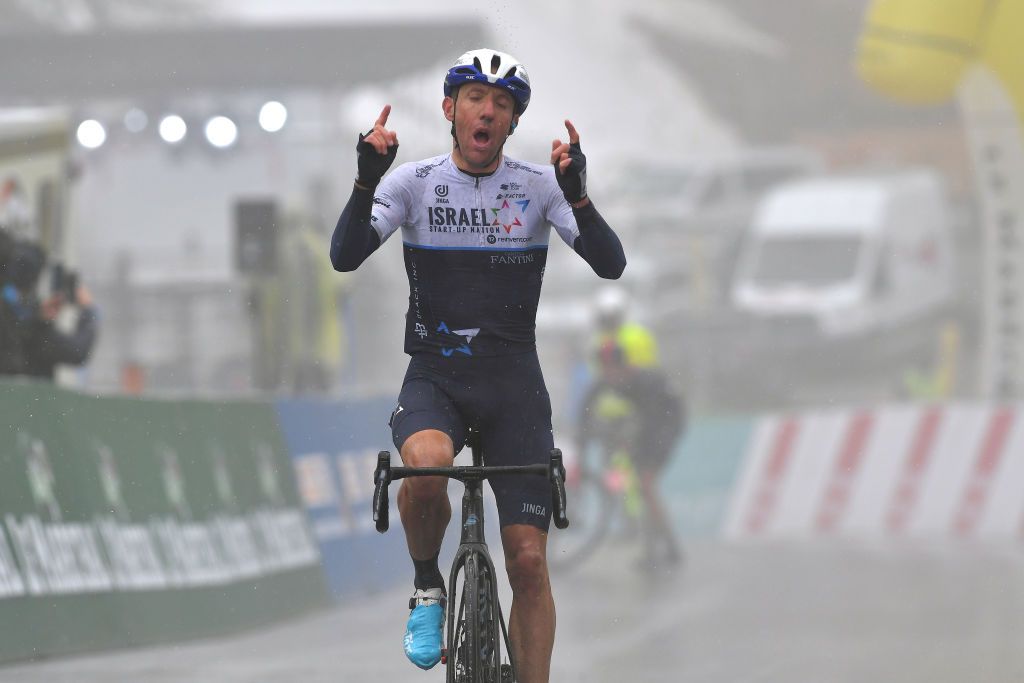 THYON 2000 LES COLLONS SWITZERLAND MAY 01 Michael Woods of Canada and Team Israel StartUp Nation celebrates at arrival during the 74th Tour De Romandie 2021 Stage 4 a 1613km stage from Sion to Thyon 2000 Les Collons 2076m TDR2021 TDRnonstop UCIworldtour on May 01 2021 in Thyon 2000 Les Collons Switzerland Photo by Luc ClaessenGetty Images