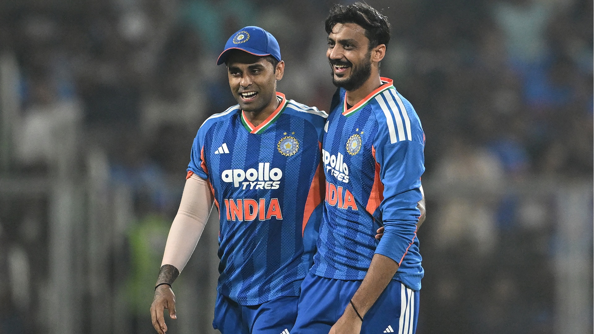 India's Axar Patel (R) celebrates with captain Suryakumar Yadav after taking the wicket of New Zealand's Glenn Phillips during the fifth and final Twenty20 international cricket match between India and New Zealand at the Greenfield International Stadium in Thiruvananthapuram on January 31, 2026. (Photo by R. Satish BABU / AFP via Getty Images) / -- IMAGE RESTRICTED TO EDITORIAL USE - STRICTLY NO COMMERCIAL USE --