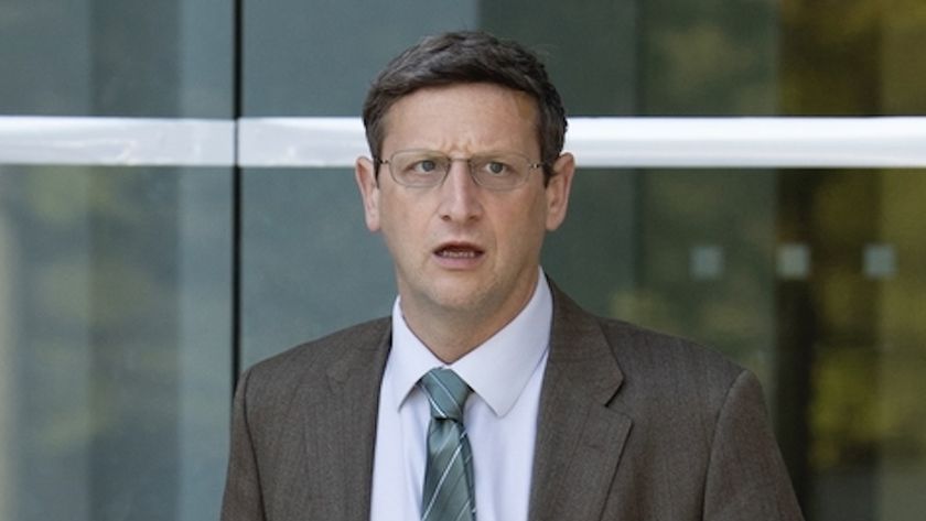 Ron standing outside confused in The Chair Company Episode 2