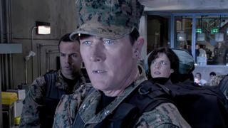 Robert Patrick in Stargate: Atlantis about to go through a Stargate.