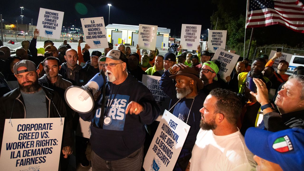 Harold Daggett, president of the International Longshoremen&#039;s Association, rallies union members as they begin strike