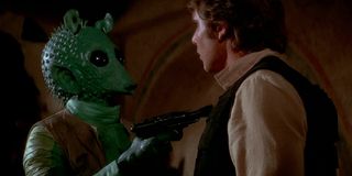 Greedo points blaster at Han Solo in Star Wars: A New Hope