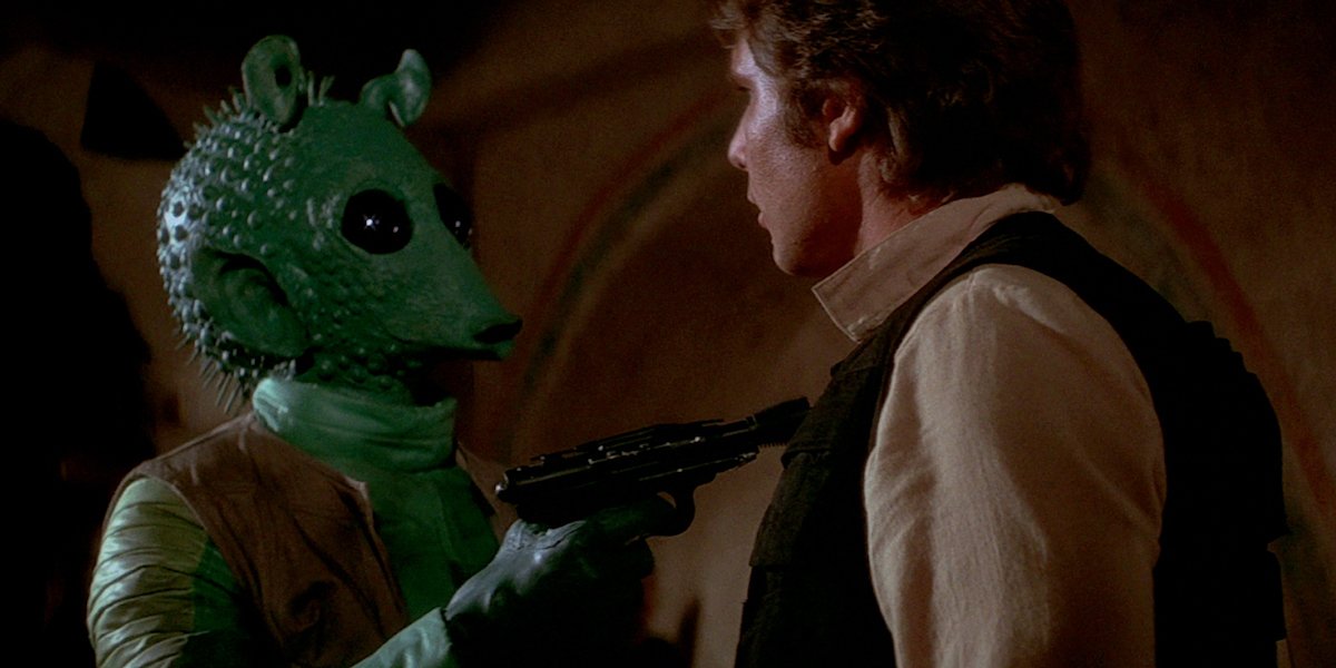 Greedo points blaster at Han Solo in Star Wars: A New Hope