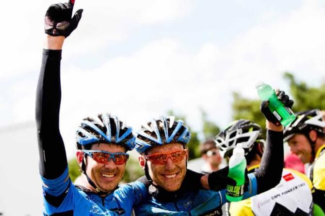 Nico Bell (left) and Gawie Combrinck of Team Westvaal Columbia celebrate after a stage win at the 2012 Cape Pioneer Trek. They have been instated as the official winners of the event.