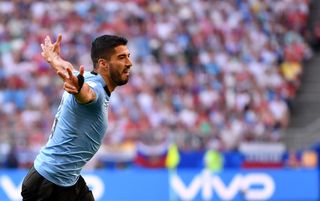 Luis Suarez celebrates after scoring for Uruguay against Russia at the 2018 World Cup