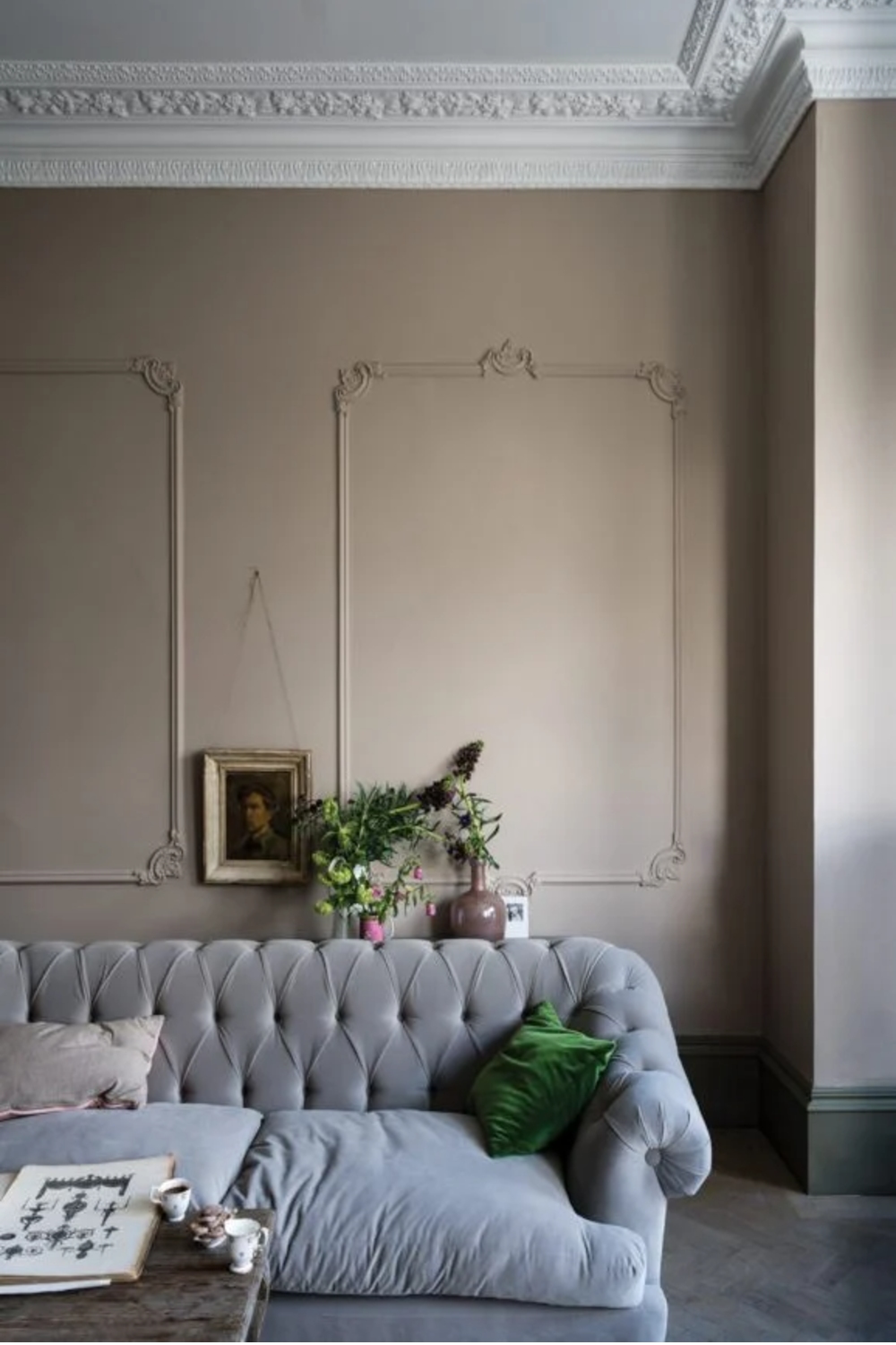 A living room wall painted in Jitney by Farrow & Ball