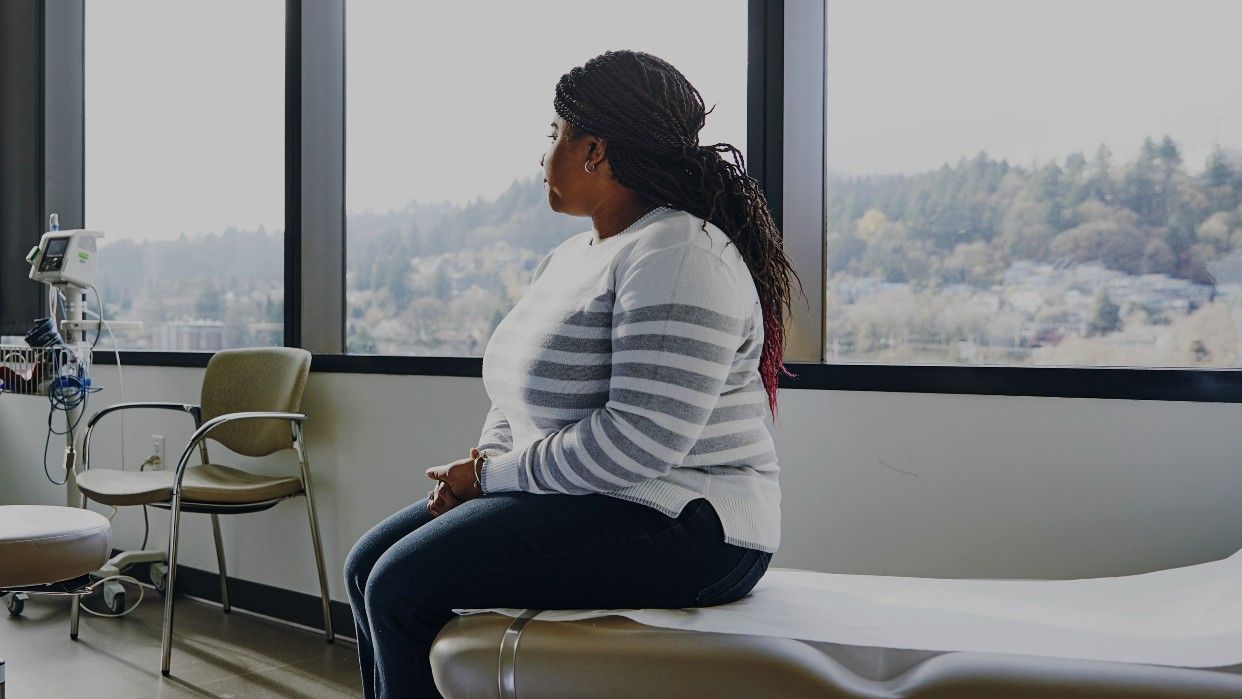 Woman on hospital bed