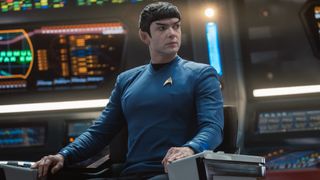 Spock sitting in the Captain's Chair. 