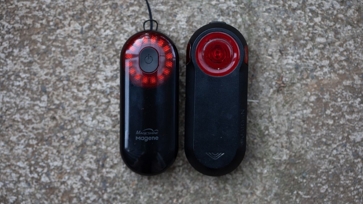 Magicshine Seemee 508 radar tail light front of unit next to Garmin