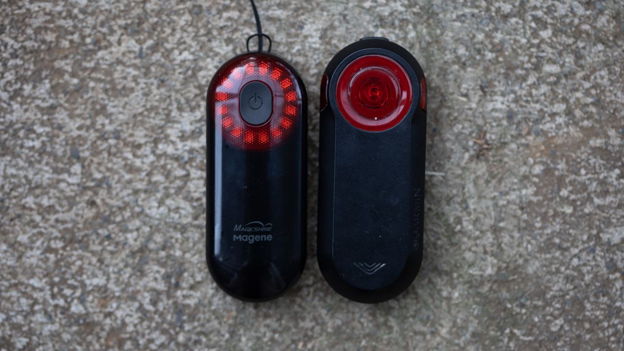 Magicshine Seemee 508 radar tail light front of unit next to Garmin