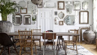 danish dining room with mirror gallery wall