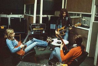 Rick Parfitt, Alan Lancaster and Francis Rossi of recording in London in 1974