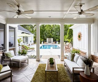 modern paved backyard with pool