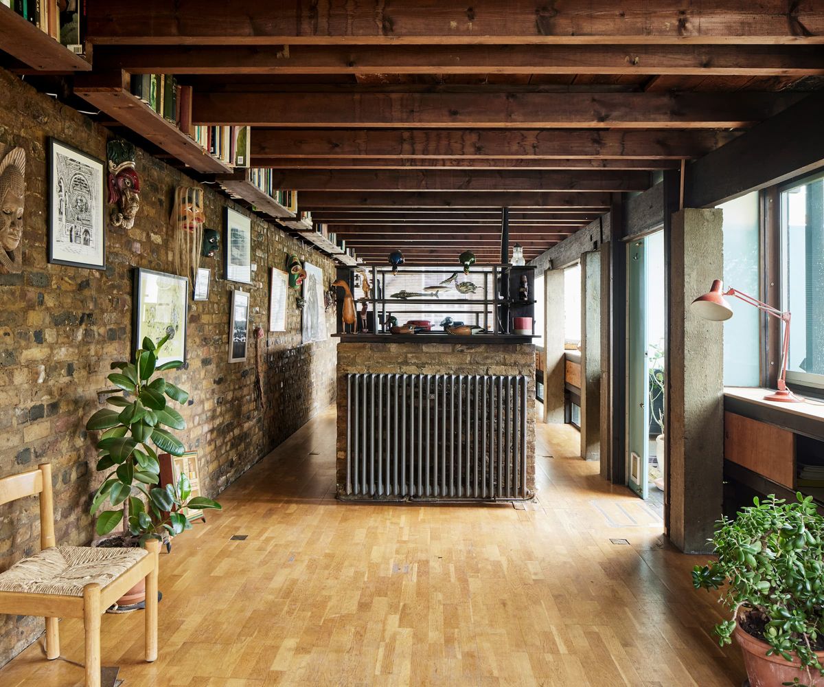 A kitchen with an antique radiator and kitchen island