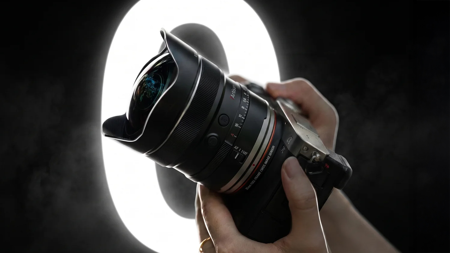 7Artisans AF 10mm f/2.5 Max on a Sony camera in front of a circular light