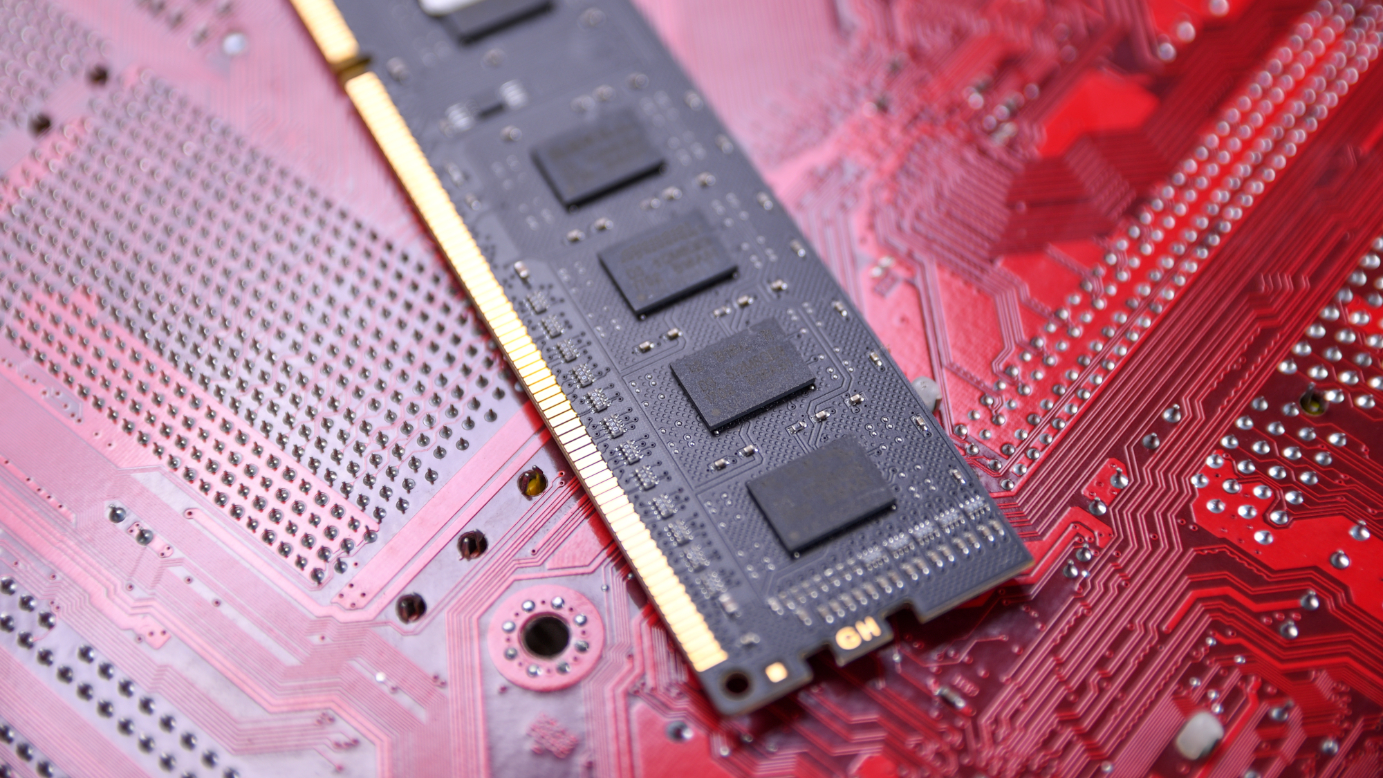 RAM stick on a red background