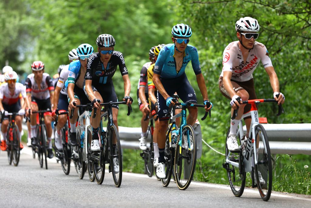 COGNE ITALY MAY 22 LR Martijn Tusveld of Netherlands and Team DSM and Harold Tejada Canacue of Colombia and Team Astana Qazaqstan compete in the breakaway during the 105th Giro dItalia 2022 Stage 15 a 177km stage from Rivarolo Canavese to Cogne 1622m Giro WorldTour on May 22 2022 in Cogne Italy Photo by Michael SteeleGetty Images