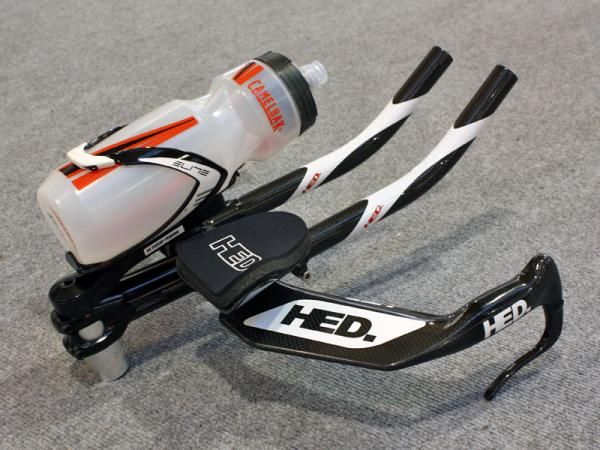 HED's new cage mount places the bottle in an aerodynamic horizontal position right in between a rider's arms.