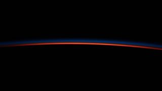 The last rays of the setting sun seen from the International Space Station.