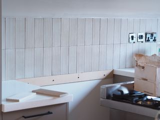 a tiled kitchen splashback