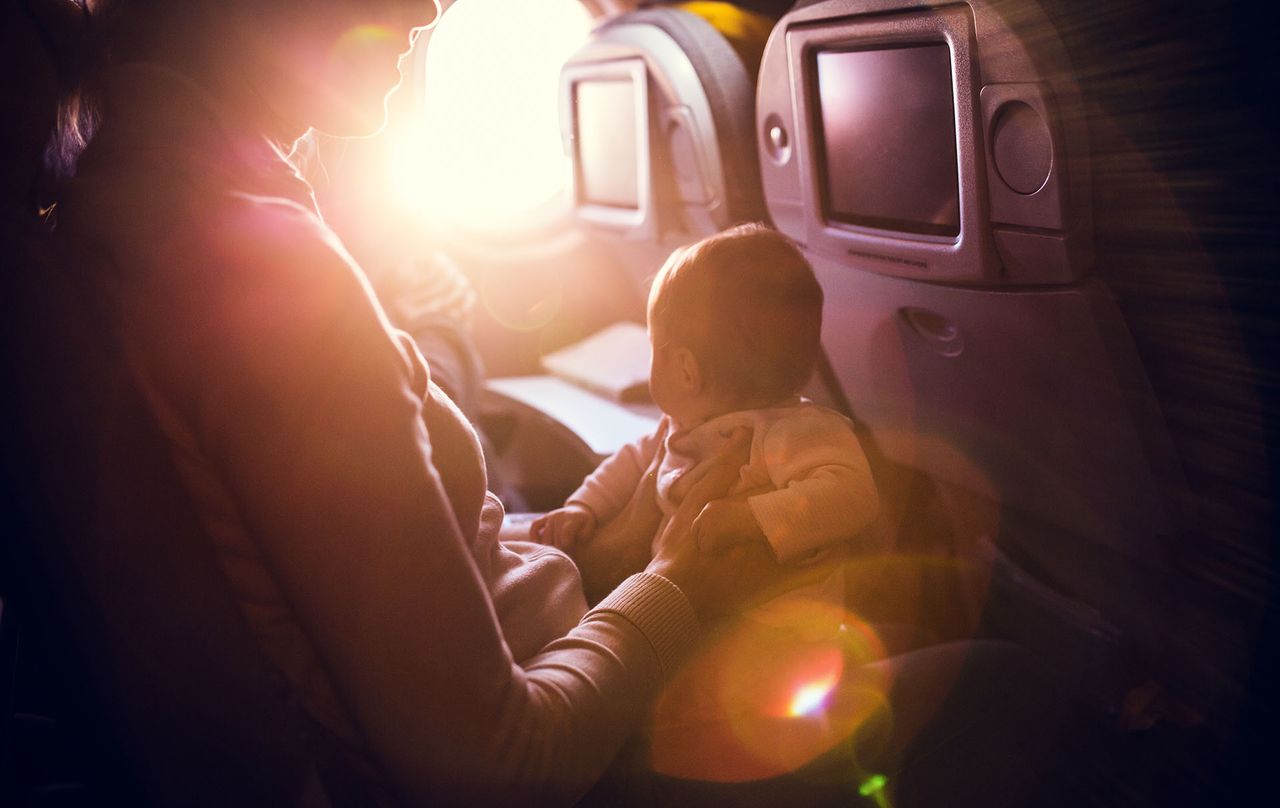 first class passenger gives seat to mum and baby