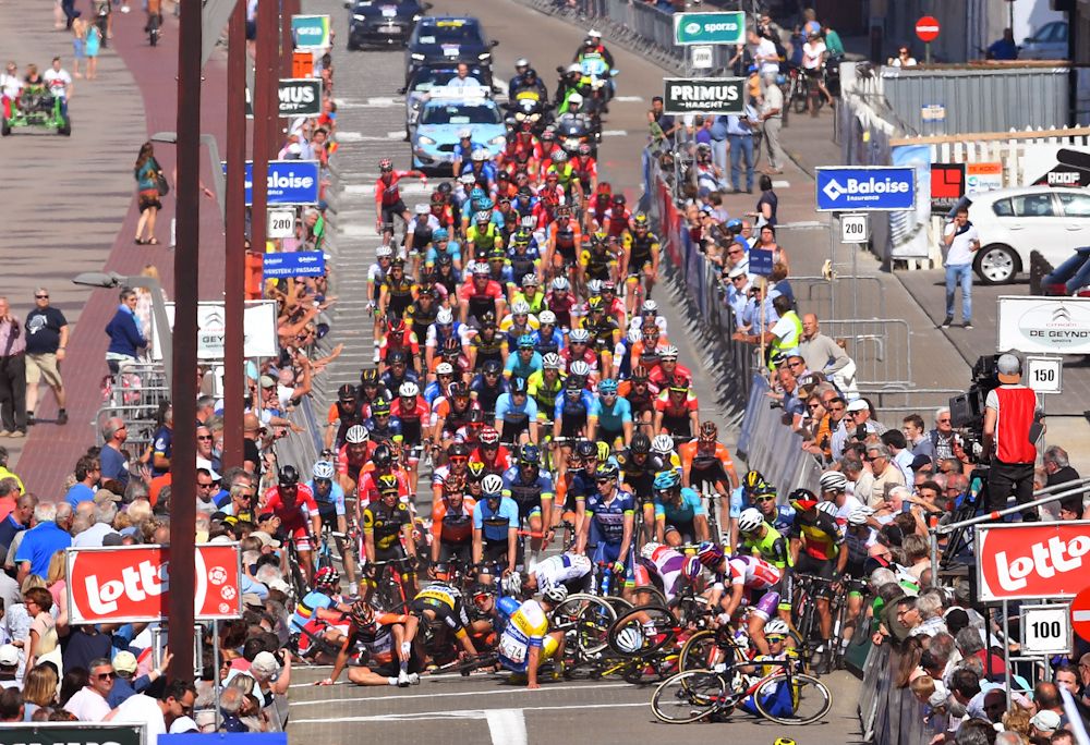 Riders are involved in a pile-up near the end of stage 1 at the Belgium Tour