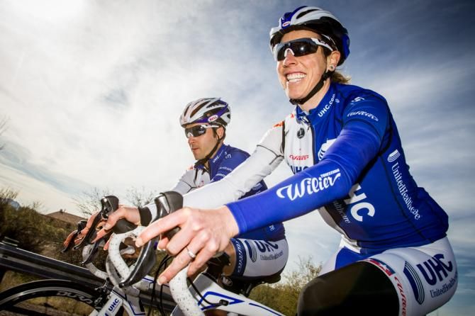 Alison Powers rides along with Lucas Euser after the long flight from the Tour of San Luis