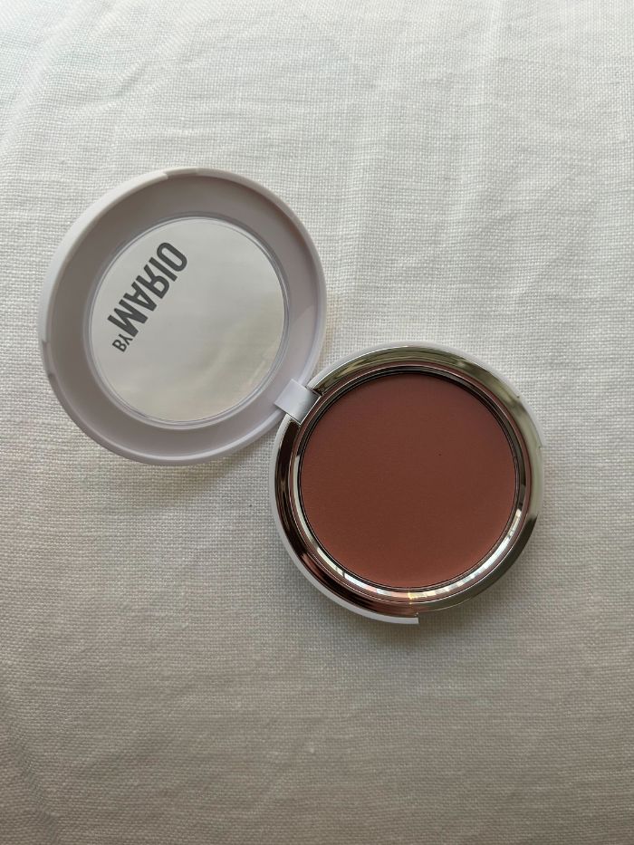 The Makeup By Mario Soft Pop Plumping Blush Veil on a white linen background