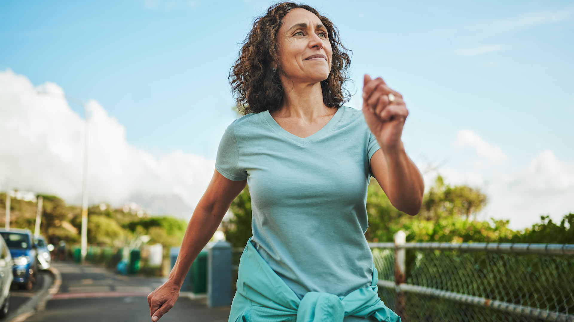 Woman walking outdoors