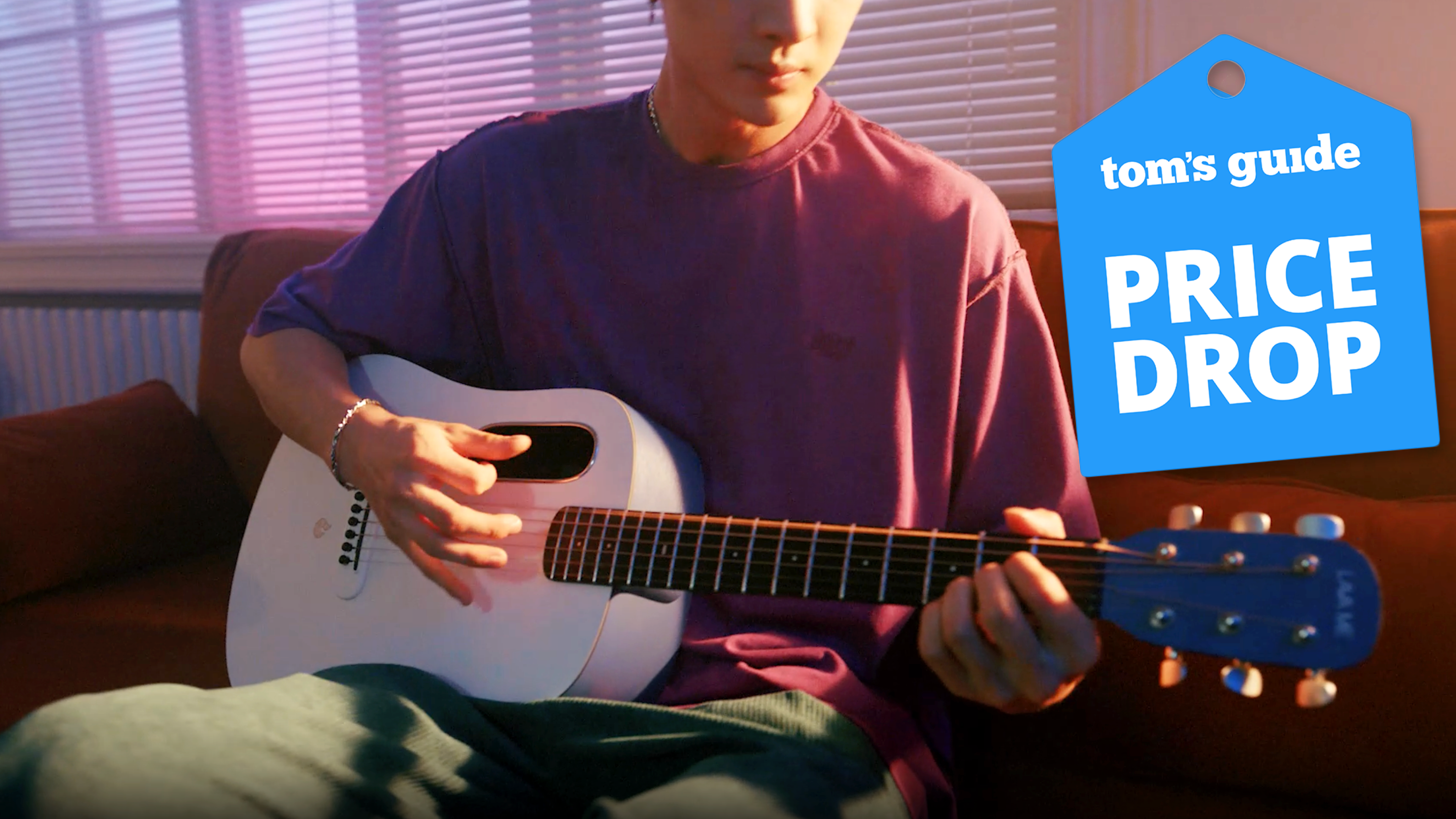 Electro acoustic smart guitar from the Guitar Center with a Tom&#039;s Guide deal badge