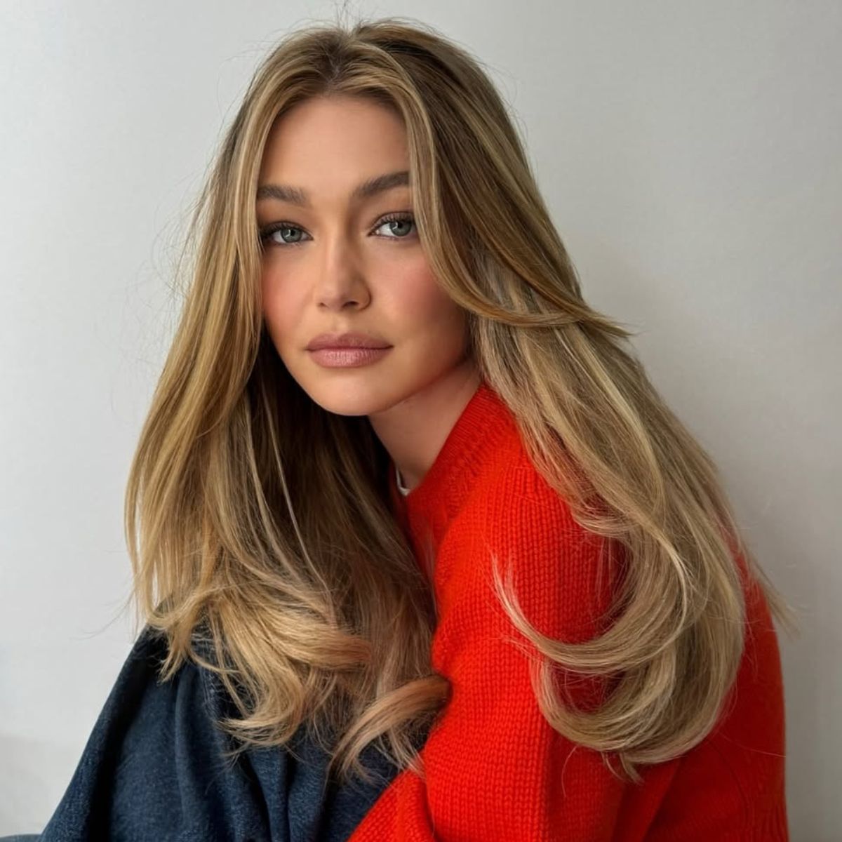 A photo of Gigi Hadid with a flicky layered long haircut