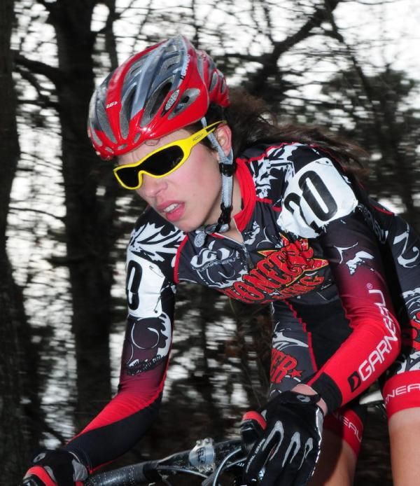 Anna Young (Pioneer Racing) descending on singletrack
