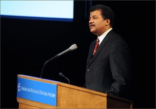 Astrophysicist Neil deGrasse Tyson, director of the Hayden Planetarium in New York City, hosts the Asimov Memorial Debate at the American Museum of Natural History.