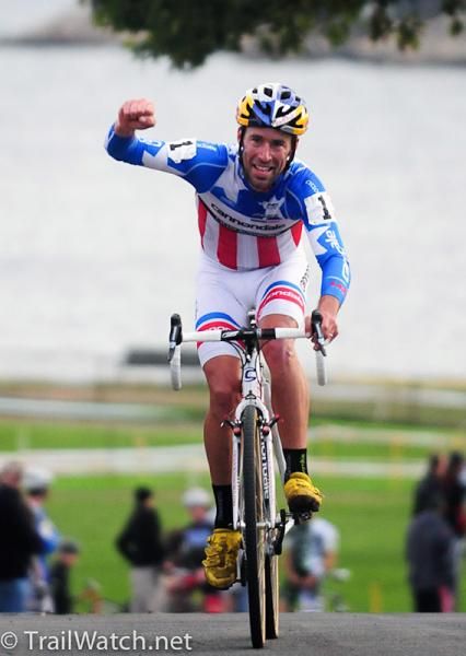 Tim Johnson (Cannondale - Cyclocrossworld.com) celebrating on the long pavement section before the finish.