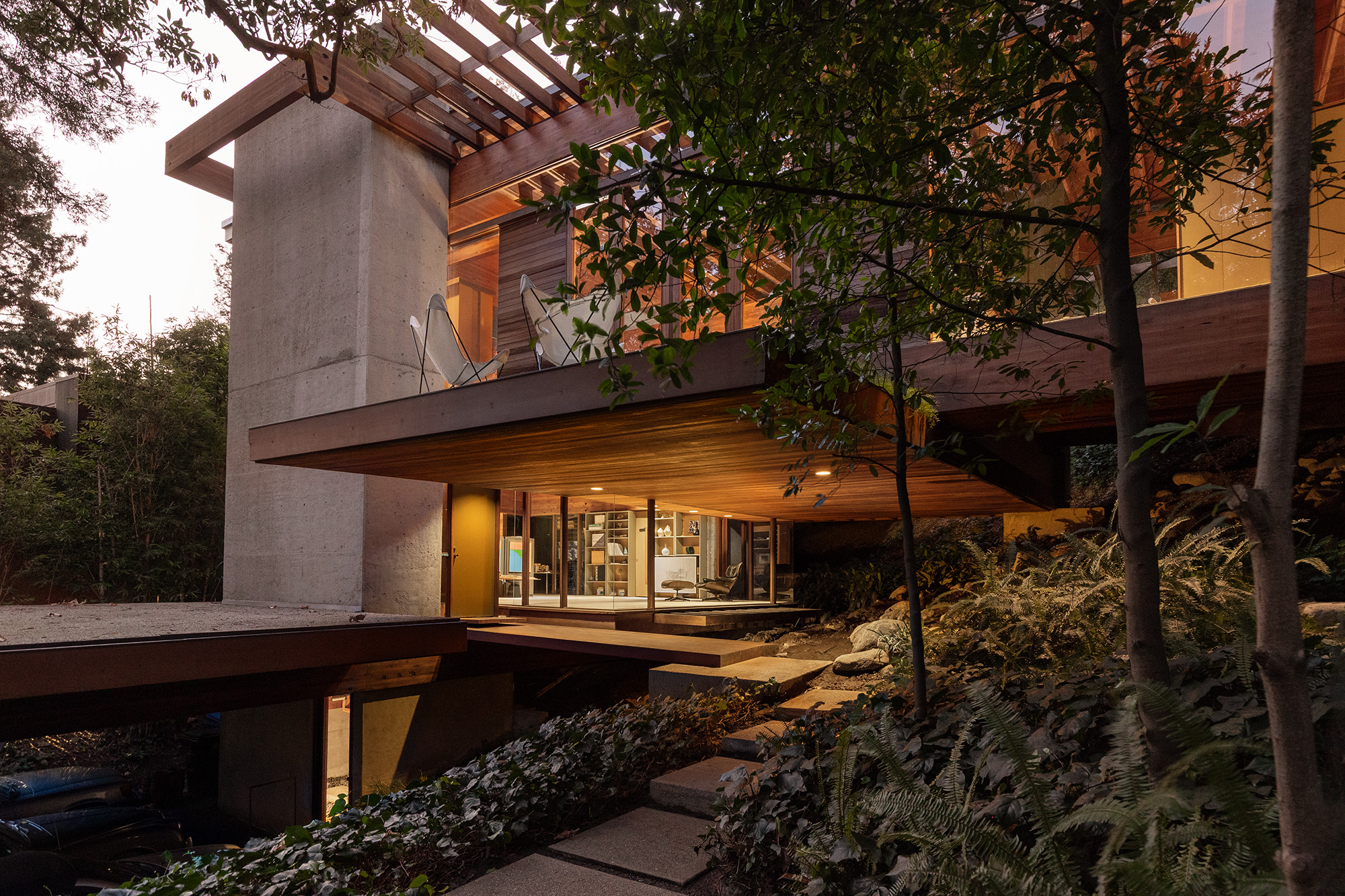 The entrance steps lead up to the glass-walled studio